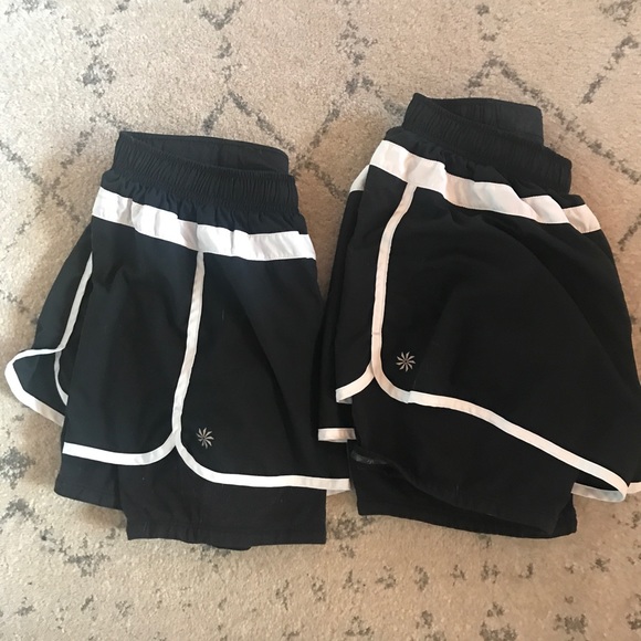 Athleta Pants - 2/for 1 Athleta running shorts. Black and white